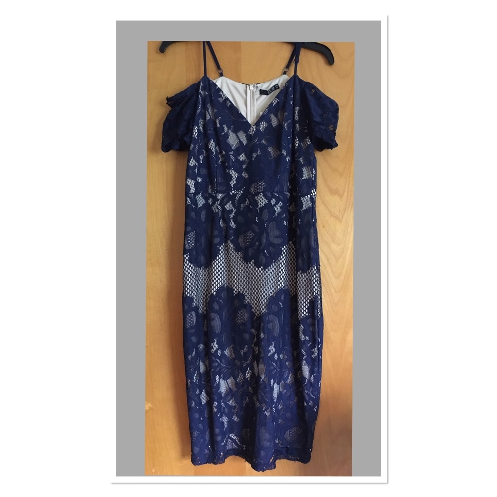 Navy lace dress with light tan liner.
